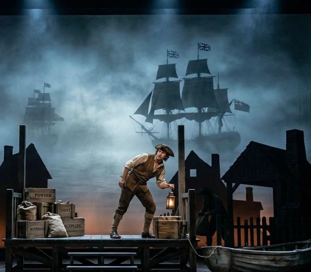 Spy with lantern on the docks at night